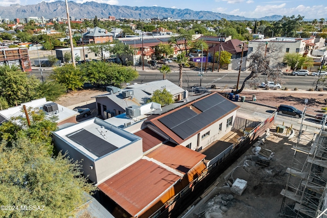 birds eye view of property featuring a mountain view