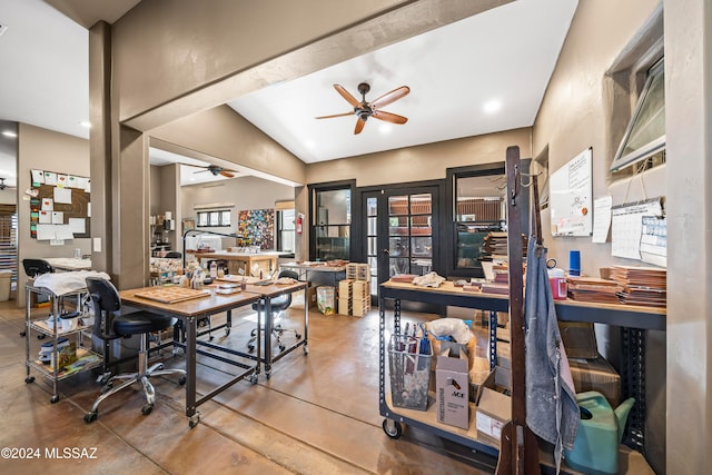 home office with concrete flooring, vaulted ceiling, and ceiling fan