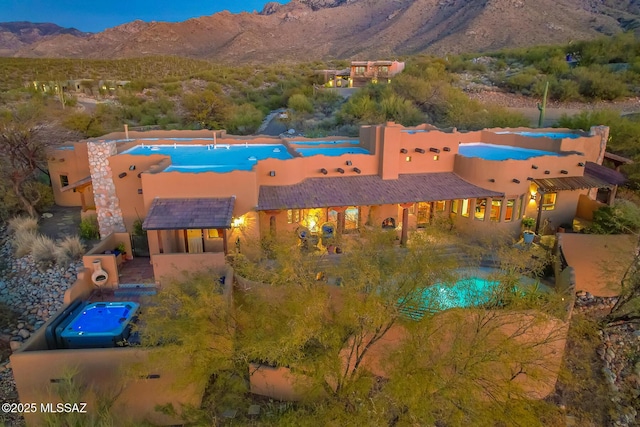 bird's eye view with a mountain view