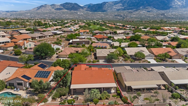 drone / aerial view featuring a mountain view