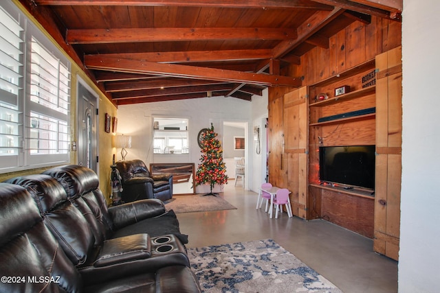 living room featuring vaulted ceiling with beams, a wealth of natural light, concrete flooring, and wooden ceiling