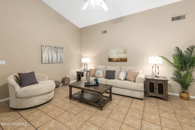 living room with light tile patterned floors, high vaulted ceiling, and ceiling fan