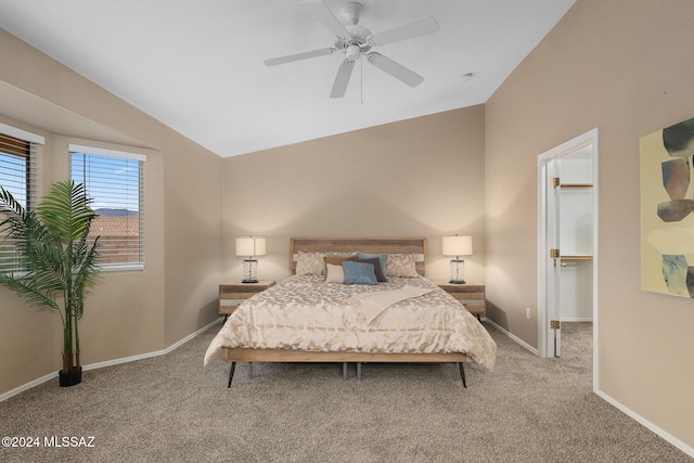 bedroom with carpet, ceiling fan, and lofted ceiling