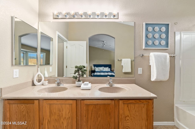 bathroom featuring vanity and ceiling fan