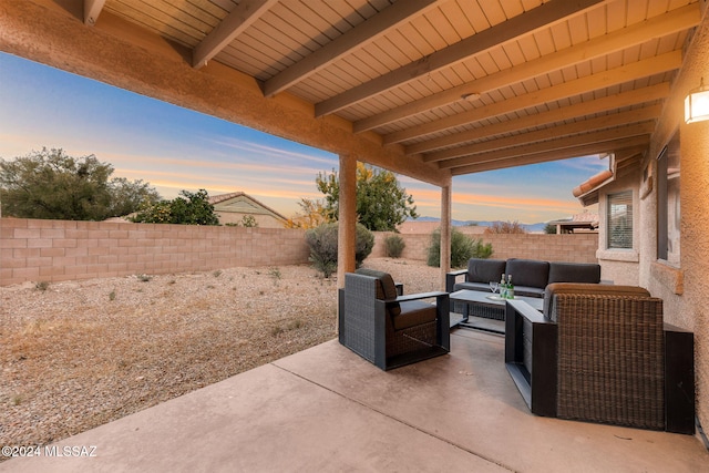 patio terrace at dusk with an outdoor hangout area