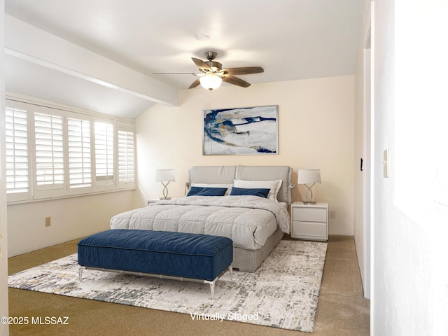 bedroom with vaulted ceiling with beams, carpet floors, and ceiling fan