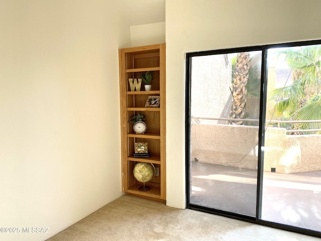 5675 N Camino Esplendora Unit 5228, Tucson, AZ 85718 - unfurnished room featuring light colored carpet