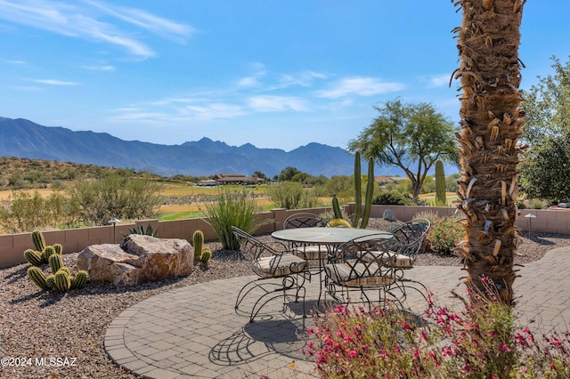 view of patio with a mountain view