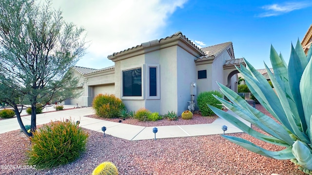 view of front of home featuring a garage