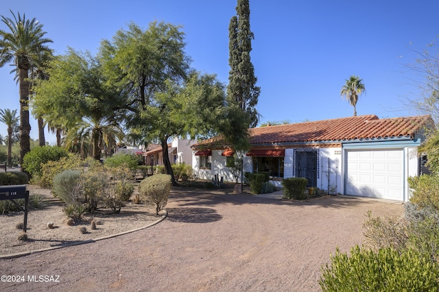 view of front of property with a garage