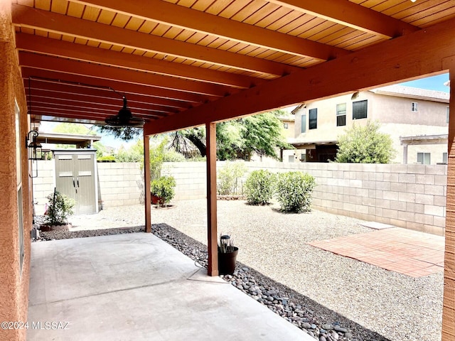 view of patio with ceiling fan