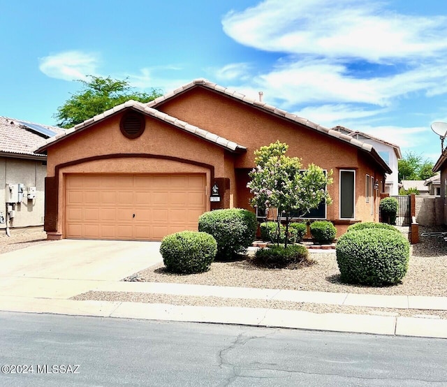 view of front of home featuring a garage