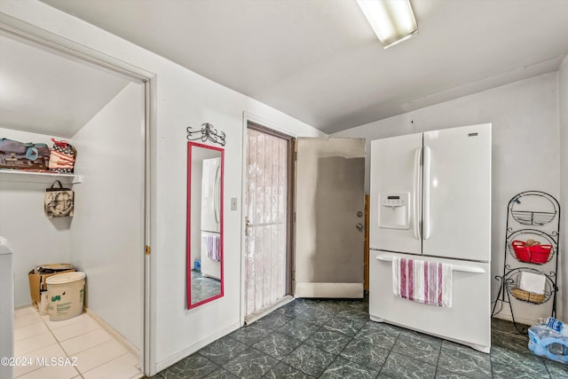 kitchen with white fridge with ice dispenser