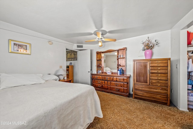 bedroom featuring ceiling fan and carpet floors