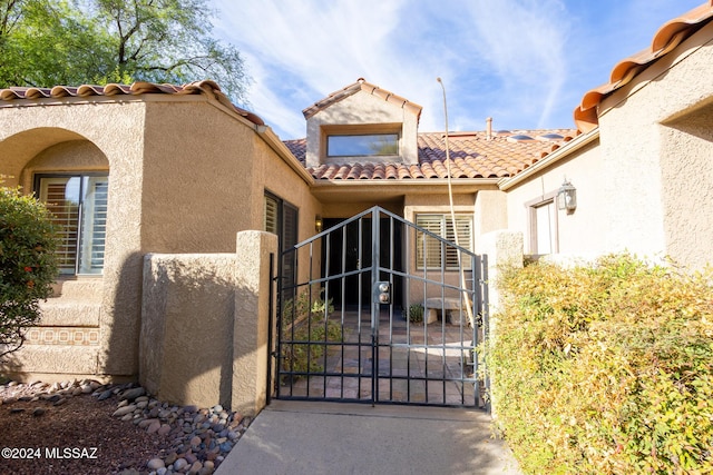 view of gate featuring fence