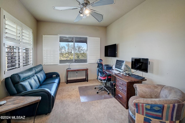 office area with light colored carpet and ceiling fan