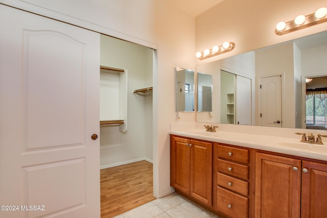 bathroom featuring vanity and hardwood / wood-style flooring