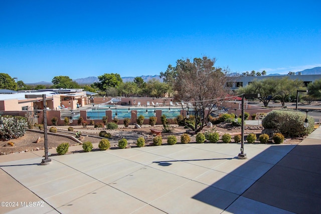 surrounding community featuring a mountain view