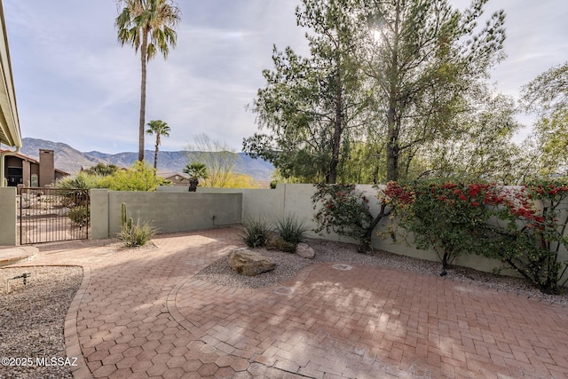 view of patio / terrace with a mountain view