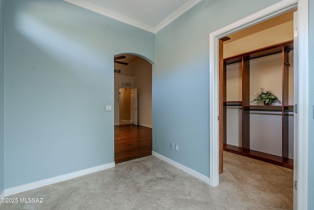 unfurnished room featuring crown molding