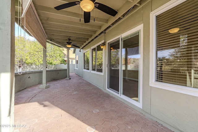 view of patio featuring ceiling fan