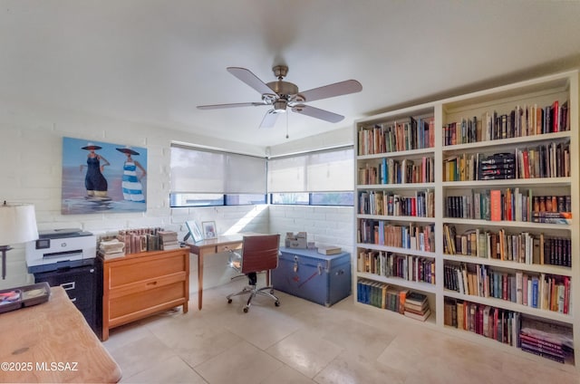 tiled home office with ceiling fan