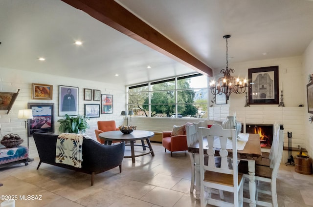 tiled dining space featuring beamed ceiling