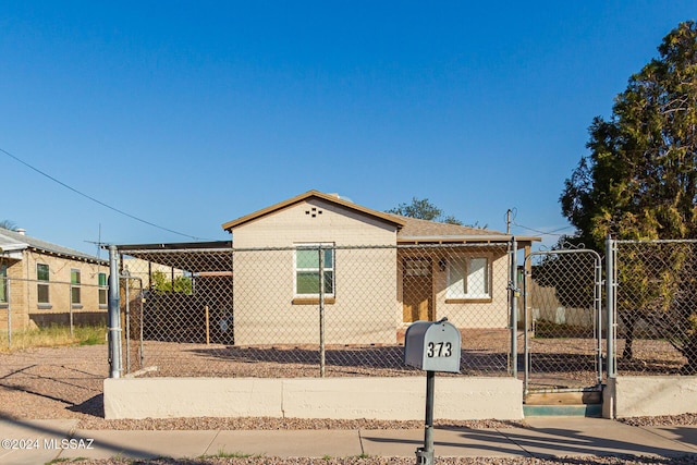 view of front facade featuring a carport