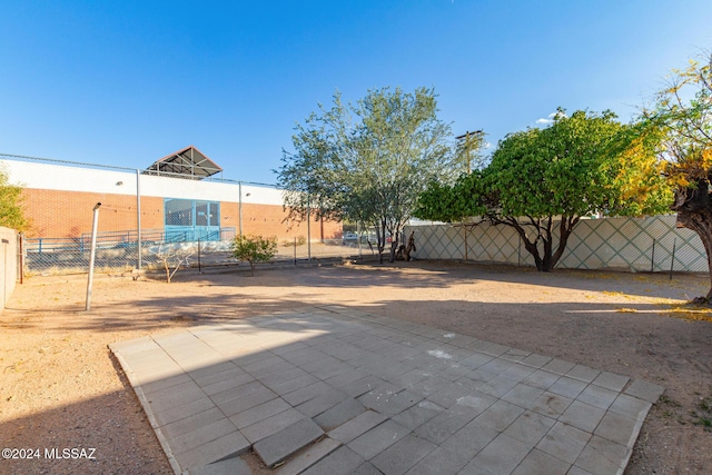 view of patio featuring basketball court