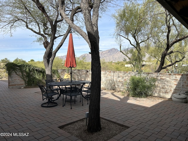 view of patio featuring a mountain view