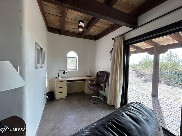 home office featuring beamed ceiling, ceiling fan, and wooden ceiling