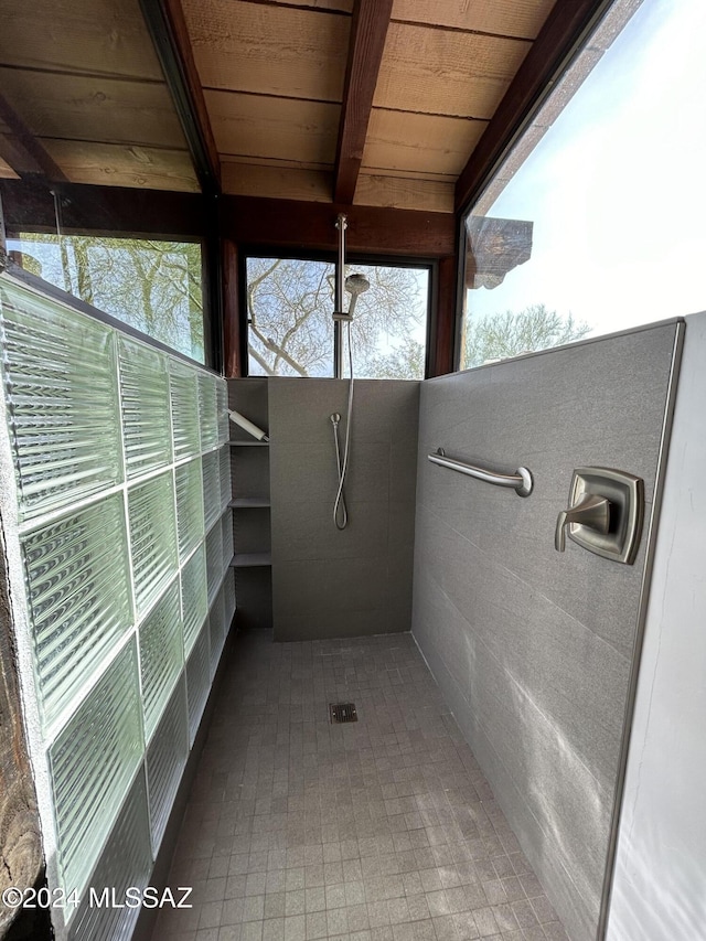 bathroom with beam ceiling and wood ceiling