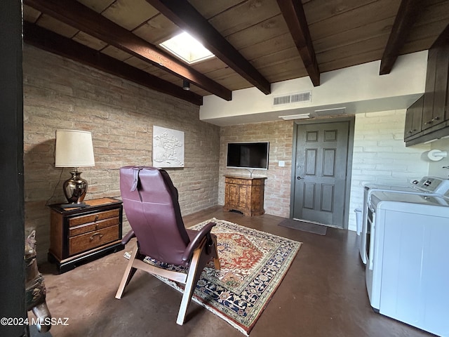 home office with beamed ceiling, independent washer and dryer, brick wall, and wooden ceiling