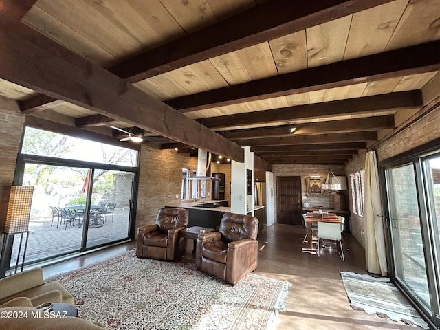 living room with ceiling fan, beamed ceiling, and wood ceiling