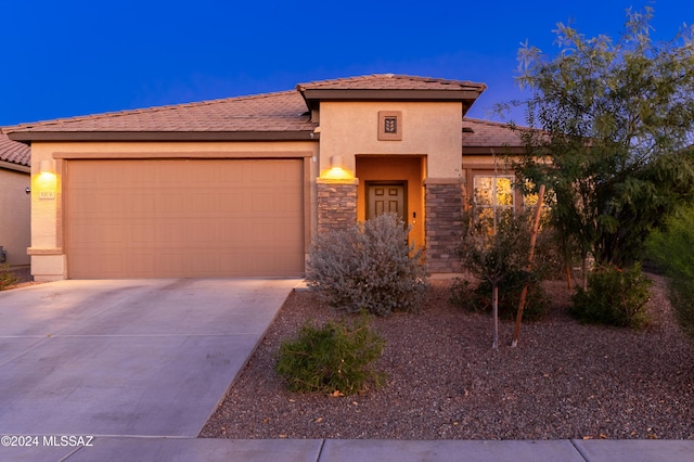 view of front of home with a garage