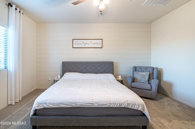 bedroom with ceiling fan and carpet