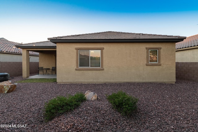 view of home's exterior featuring a patio area