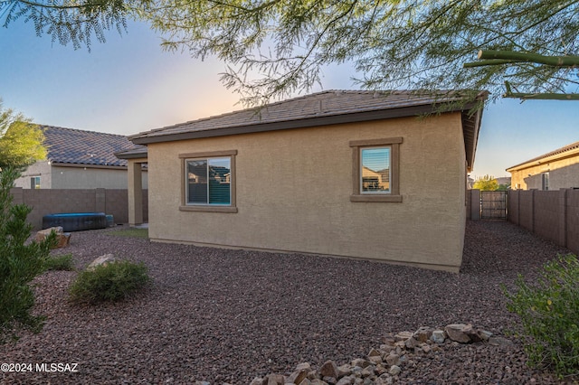 view of property exterior at dusk