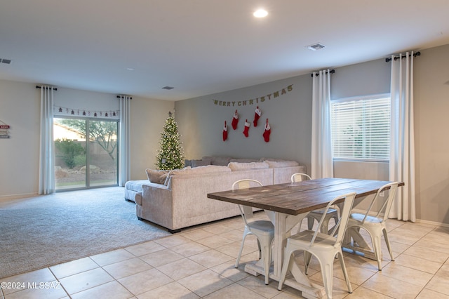 dining room with light tile patterned flooring