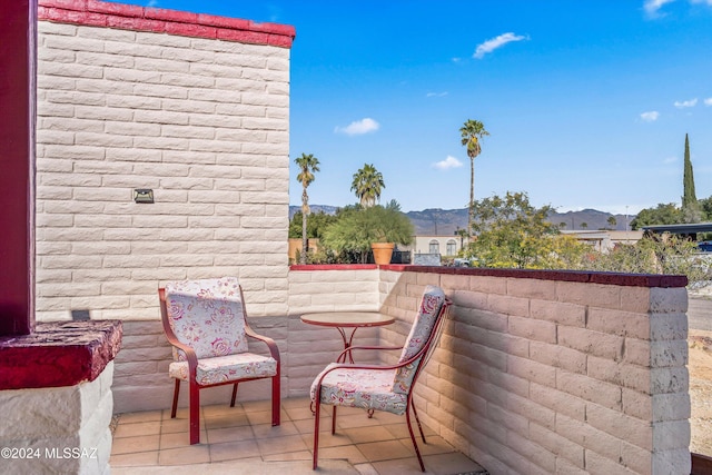 balcony featuring a mountain view