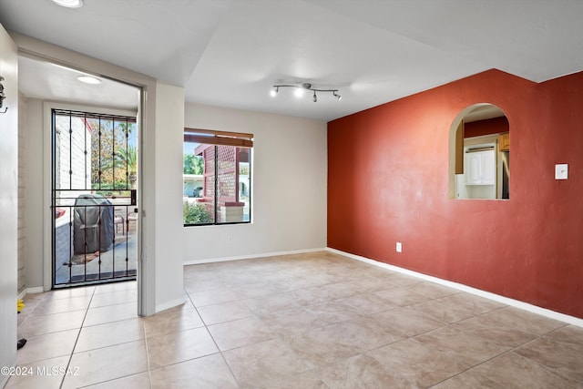 view of tiled empty room