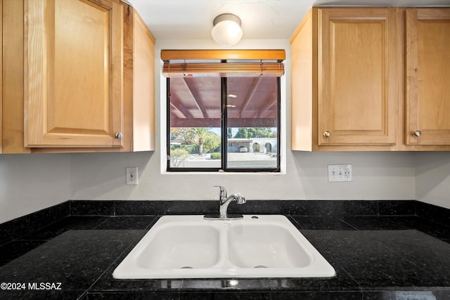 kitchen with sink and light brown cabinets