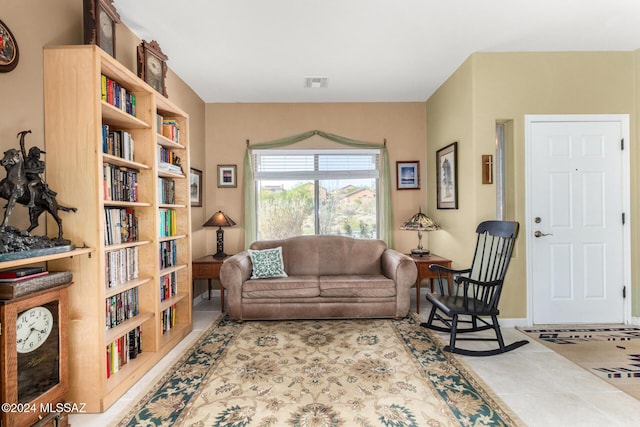 living room with light tile patterned floors