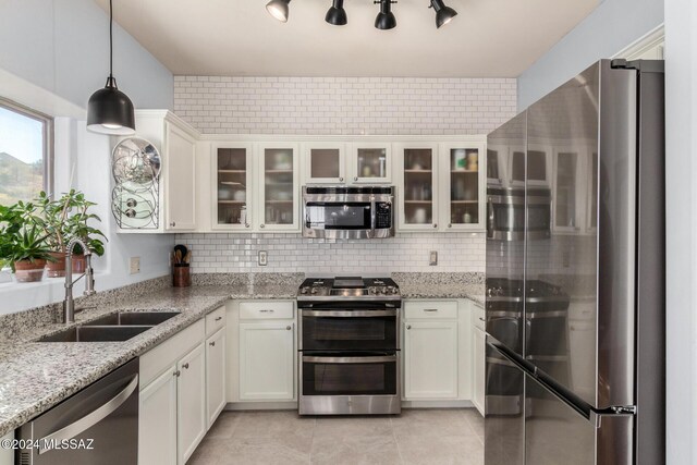 tiled dining room featuring ceiling fan