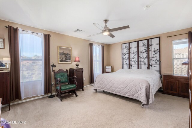 living area with light colored carpet