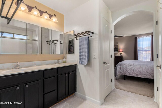 bedroom with ceiling fan and light carpet