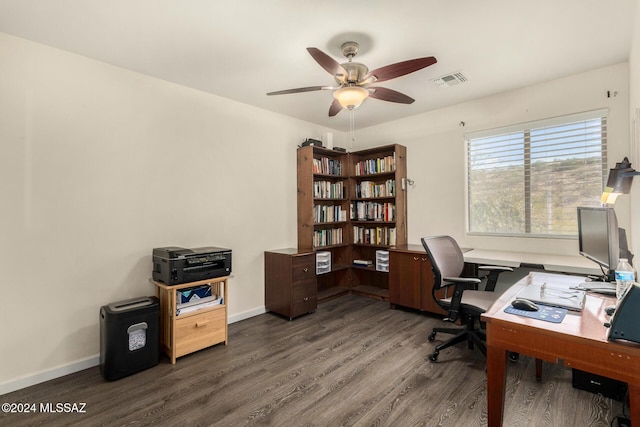 living area with light colored carpet and ceiling fan