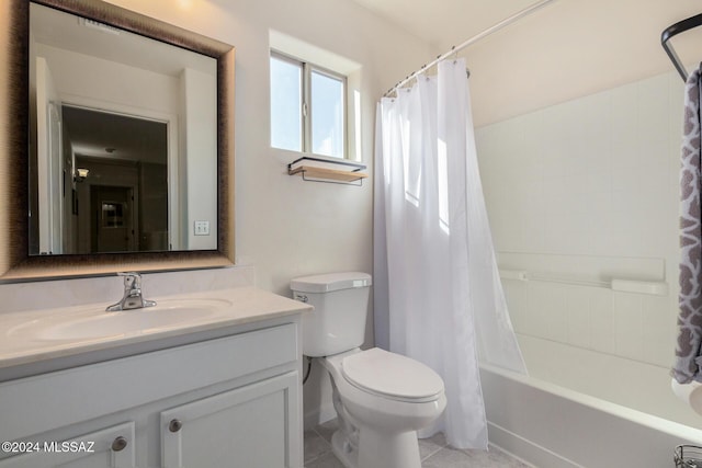 full bathroom with shower / bathtub combination with curtain, vanity, tile patterned floors, and toilet