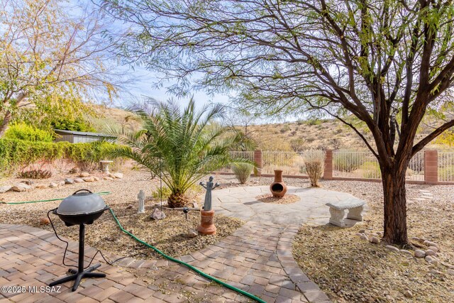 rear view of property featuring a patio, cooling unit, and a pergola