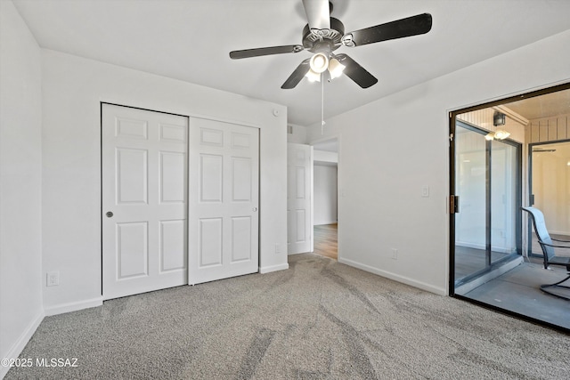 unfurnished bedroom with ceiling fan, access to exterior, a closet, and carpet floors